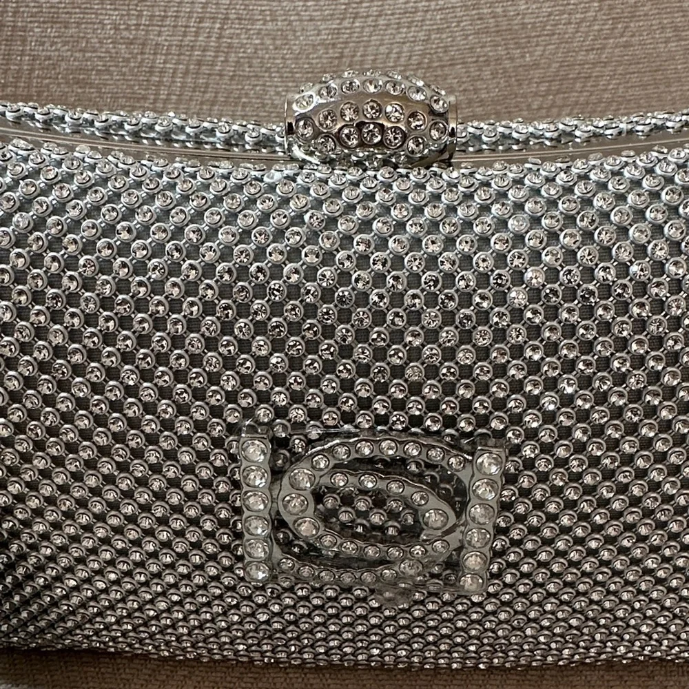 Bebe Sparkling Silver Clutch and Shoulder evening bag